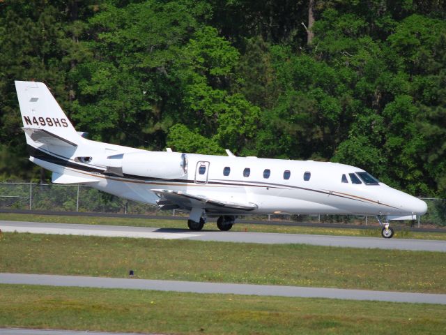 Cessna Citation Excel/XLS (N499HS) - Taking off on runway 03 - 4/24/09  Registered Owner:  MARATHON HOLDINGS LLC