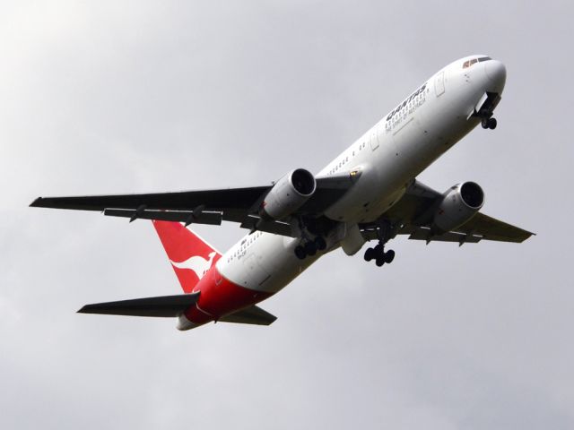 BOEING 767-300 (VH-ZXF) - Getting airborne off runway 23 0n a gloomy, cold winters day. Wednesday 4th July 2012.