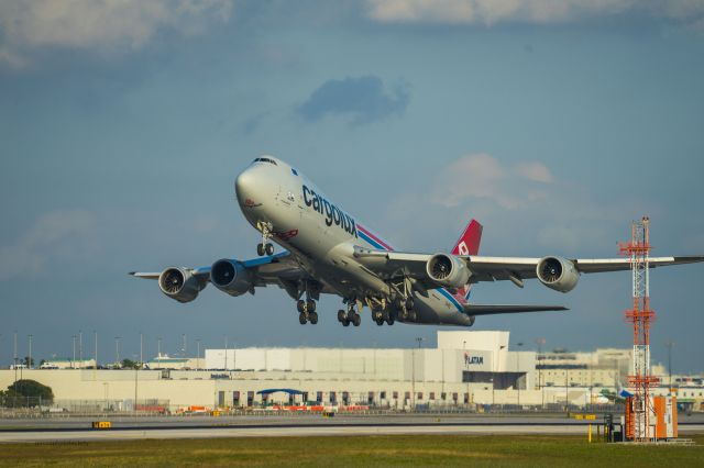 LX-VCL — - Departure of Cargolux Flight from Miami International Airport on Runway 27.