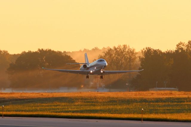 Cessna Citation Latitude (N581QS) - Colorful fall background as N581QS, a NetJets Cessna Citation Latitude departs Toledo on 18 Oct 2019.