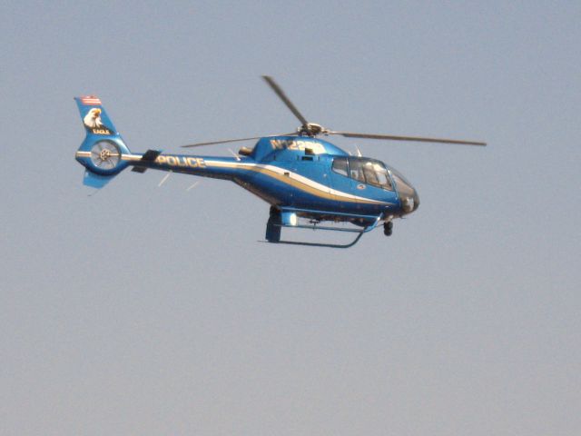 N122PD — - Newport Beach police chopper lifting off from Santa Ana
