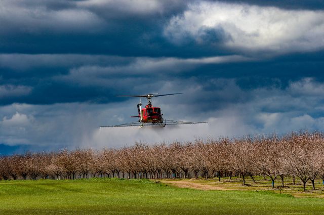 N127RA — - Spraying Almonds