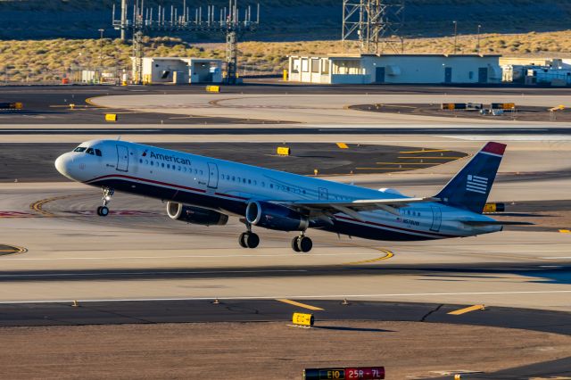 Airbus A321 (N578UW) - American Airlines A321 in US Airways retro livery taking off from PHX on 11/11/22. Taken with a Canon R7 and Tamron 70-200 G2 lens.