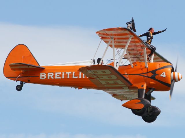 — — - Breitling Wingwalkers perform a final flypast at end of flying routine during Flying Legends 2012.