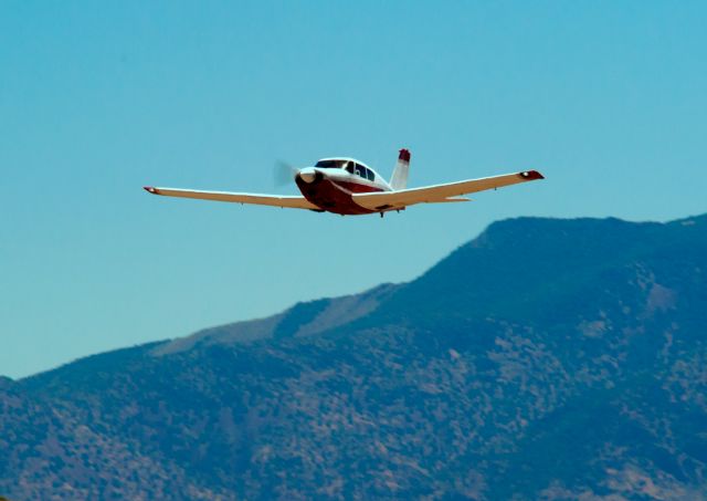 Piper PA-24 Comanche (N7018P) - A couple of planes were good enough to do low passes for the attendants at the Carson City open house.