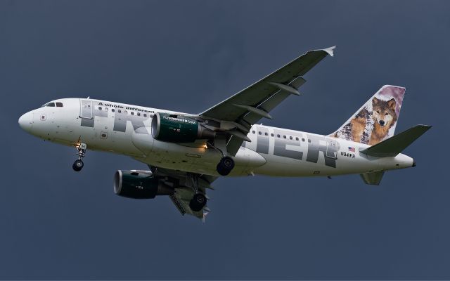 Airbus A319 (N941FR) - 8/22/15. Huge thunderstorm east of the field and all scrambling to get in. Final to 1L.