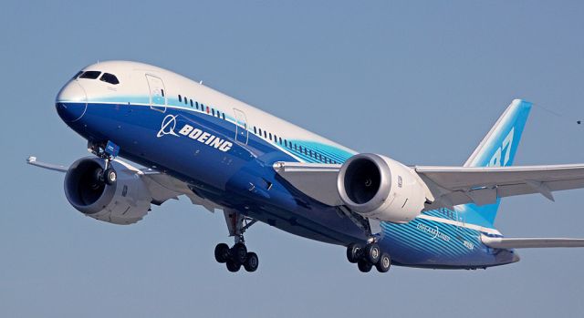 Boeing 787-8 (N787BA) - Boeings 787 Dreamliner departs OSH at the EAA fly-in.