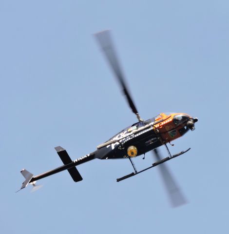 Bell JetRanger (N10XV) - This is an NBC Helo from Phila., PA hovering, summer 2019.