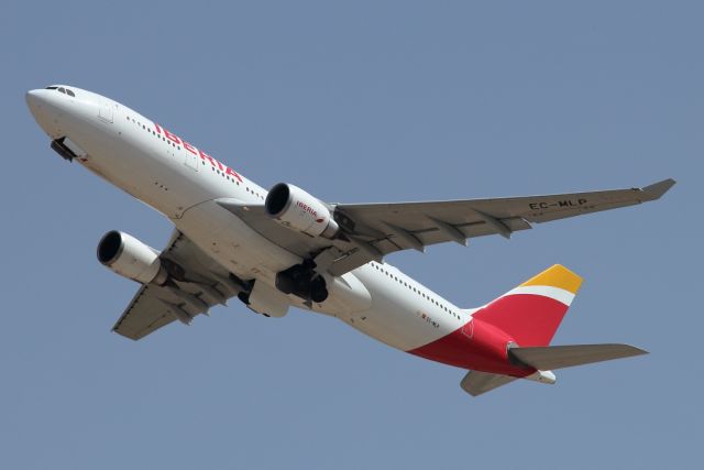 Airbus A330-200 (EC-MLP) - 07/04/2021: Climbing from runway 26, enroute Madrid.