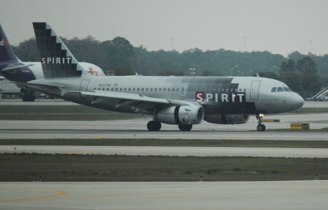 Airbus A319 (N522NK) - Rolling out on landing at RSW on 02/11/2011