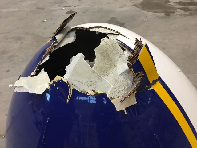 Boeing 757-200 (TF-FIA) - Removed nose cone showing affects of lightning strike.