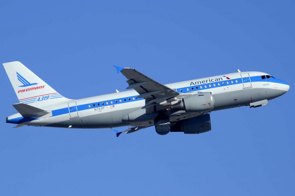 Airbus A319 (N744P) - American Airbus A319-112 N744P Piedmont Pacemaker on December 22, 2014. It first flew as D-AVWD on July 12, 2000. It was delivered to US Airways registered as N744US on August 3, 2000 and re-registered it as N744P on May 12, 2006. Its construction number is 1287. It was merged into the American Airlines fleet on December 10, 2013. 