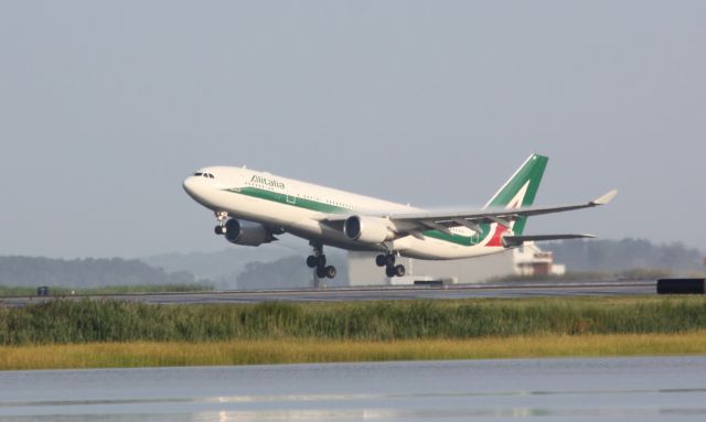 Airbus A330-200 (EI-DIP) - Liftoff after a heavy rain storm