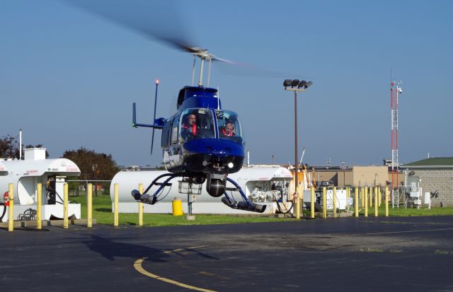 Bell JetRanger (N11TV) - LINDEN AIRPORT-LINDEN, NEW JERSEY, USA-AUGUST 29, 2018: A news helicopter from one of the local New York City T.V. stations is pictured after refueling.