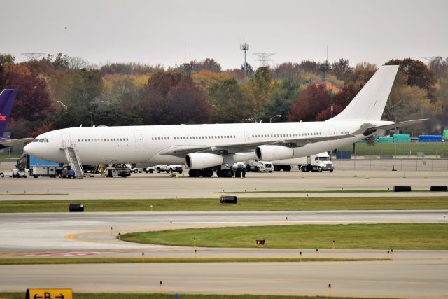 Airbus A340-300 (CS-TQY) - 11-13-21. Preighter aircraft. Aircraft arrived previous evening from ANC.  Economy section has seats stripped out, and aircraft was bulk loaded.