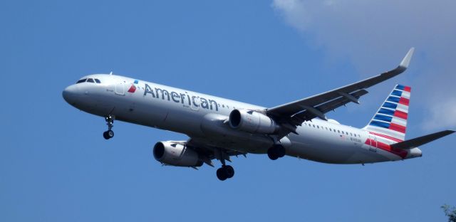 Airbus A321 (N149AN) - On short final is this 2015 American Airlines Airbus 321-231 in the Summer of 2023.