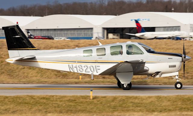 Beechcraft Bonanza (36) (N1820F) - N1820F taxis from Atlantic West towards Runway 29 for departure.