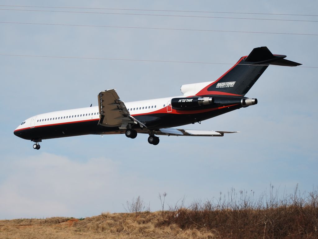 BOEING 727-200 (N727NK) - ROUSH AIR LLC landing on runway 23 - 2/10/09