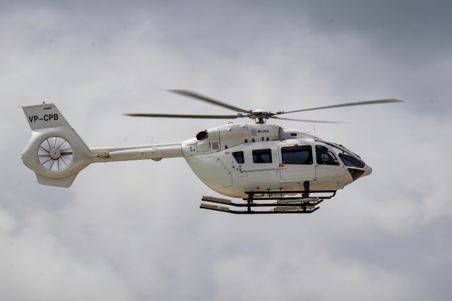 KAWASAKI EC-145 (VP-CPB) - Airbus Helicopters H145 crossing my lens