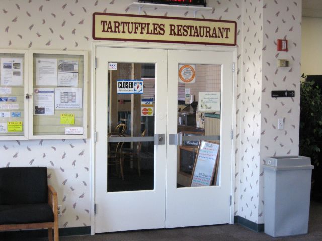— — - Entrance to Tartuffles Restaurant