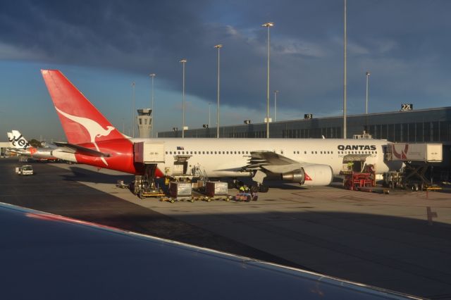 VH-OGH — - Being prepared for flight to Darwin ,at terminal 1, mid-morning. Wed. 17th July 2013.