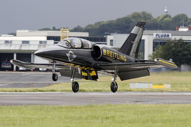 Aero L-39 Albatros (ES-YLP) - www. flyer1dighton.co.uk  Breitling Jet Team Aero L-39C Albatros ES-YLP/7 [cn.533620]. Full-flaps and landing at the Farnborough FAB International Airshow England.