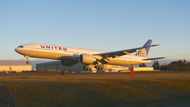 BOEING 777-300 (N2332U) - BOE752 on short final to Rwy 34L to complete a C1 flight on 12.16.16. (ln 1461 / cn 62644). 