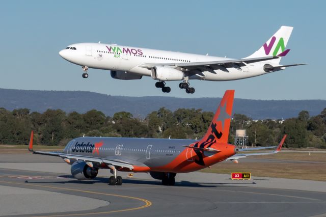 Airbus A330-300 (EC-NBN) - Airbus A321-251NX cn 11229. Jetstar Airways VH-OFS heading for runway 03 departure, EC-NBN Wamos Air arrival YPPH 01 July 2023