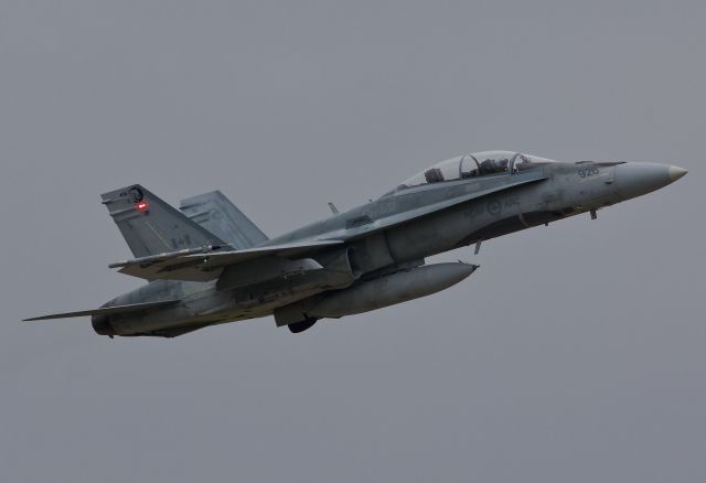 McDonnell Douglas FA-18 Hornet (18-8926) - Royal Canadian Air Force CF-188B Hornet departing NAS Fort Worth JRB for a training sortie on an overcast Texas afternoon. This "family model" two seat Hornet experienced a very slow retraction of the left main gear. The nose and right main retracted quickly however the rear left can be seen finally retracting. (Please view in "full" for best image quality)