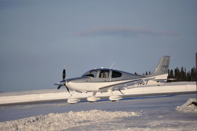 Cirrus SR-22 (N214CT) - Parked at Woodwards Aviation waiting to cross pond.