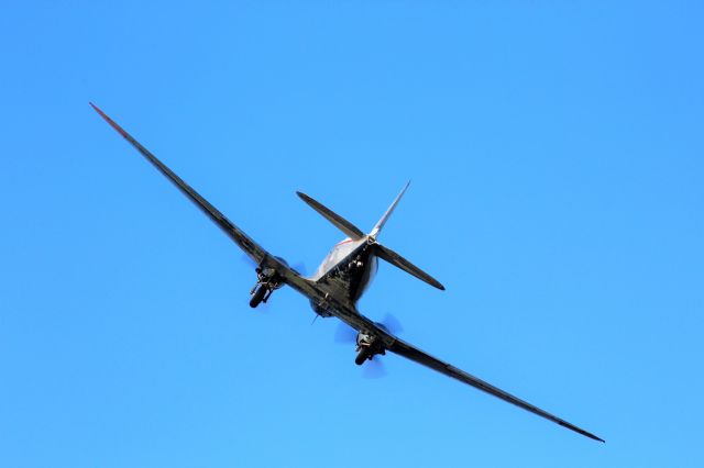 Douglas DC-3 (N472AF) - DC 3 in a steep bank at Oshkosh 2017.  