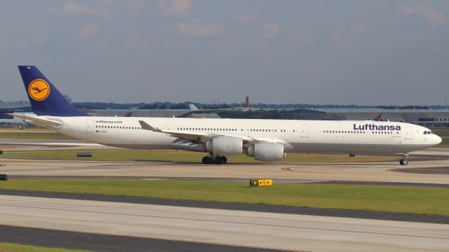 Airbus A340-600 (D-AIHV) - October 6, 2018 -- Lufthansa 446 departs runway 9L for Frankfurt Germany.