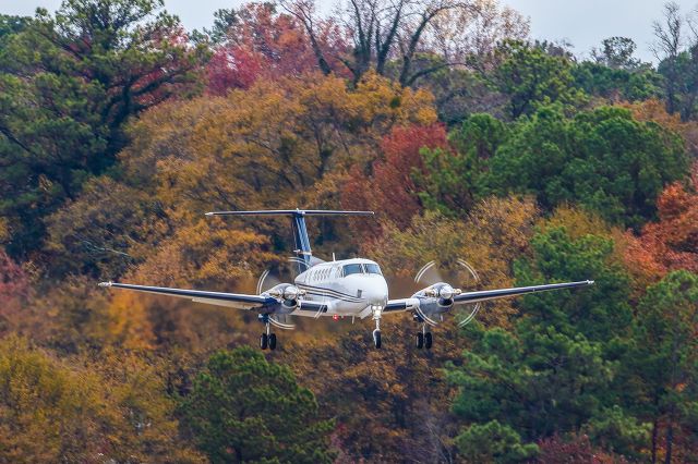 Beechcraft Super King Air 200 (N1850X) - The colors and clarity of this photos came out exceptionally well. The autumn foliage at the North end of Atlanta's PDK executive airport was more brilliant than in many years past. N1850X is a clearly well cared for 1982 Beechcraft King Air B200 as it doesn't show it's age. I shot this with a Canon 500mm lens. Camera settings were 1/250 shutter, F7.1, ISO 200. Please check out my other aviation photography. Votes and positive comments are greatly appreciated as that helps with my photography's popularity. Inquiries about prints or licensing of this photo can be sent to Info@Flews.com 