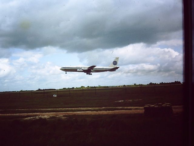 Boeing 707-100 — - TAN SON NHUT AIR BASE, SAIGON, VIETNAM 1966 PAN AM Boeing 707 just airborne. 