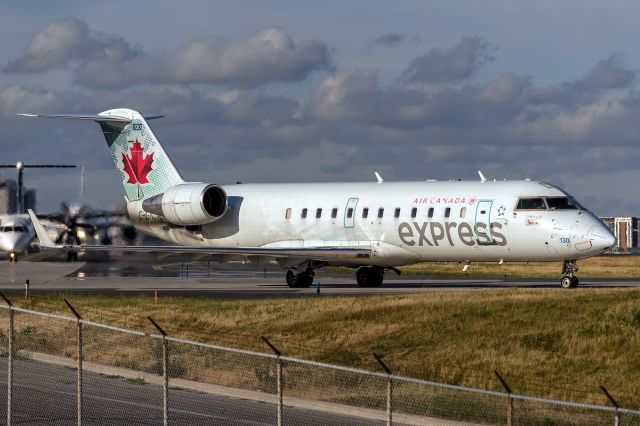 Canadair Regional Jet CRJ-200 (C-GNJA) - 18th July, 2022: Air Canada Express taxiing for departure from runway 06R at Toronto's Pearson International. 