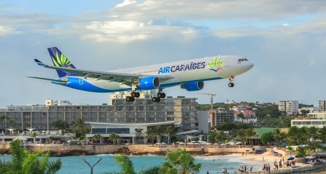 Airbus A330-300 (F-HPUJ) - Air Caraibes F-HPUJ landing for the second time at St Maarten. Ex Frenchbee aircraft.