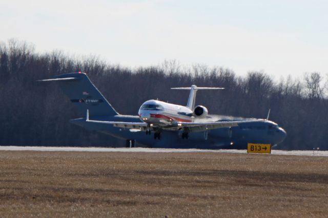 Canadair Regional Jet CRJ-200 (N417SW) - American Eagle/SkyWest SKW 3147 arriving on RWY 07 from Charlotte/Douglas Intl (KCLT) as a USAF Boeing C-17A Globemaster III holds short on 25 Mar 2018.