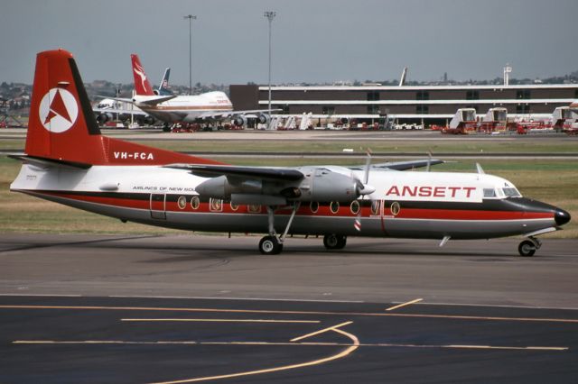 Robinson R-44 (VH-FCA) - AIR NEW SOUTH WALES (ANSETT) - FOKKER F-27-500F FRIENDSHIP - REG : VH-FCA (CN 10422) - KINGSFORD SMITH INTERNATIONAL AIRPORT SYDNEY NSW. AUSTRALIA - YSSY (17/3/1982)