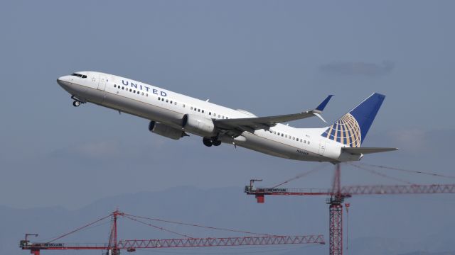 Boeing 737-900 (N36469) - Departing LAX on 25R