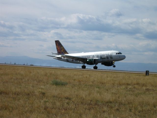 Airbus A319 (N934FR) - Landing on 35L at DIA.