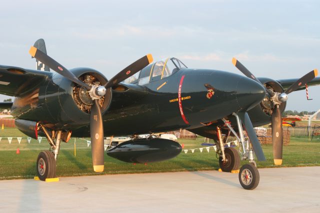 — — - Grumman Tigercat at EAA at Sunset