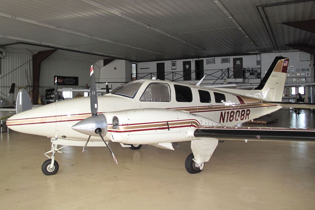 Beechcraft Baron (58) (N1808R) - A very powerful and rare pressurized 58 Baron. Note the main cabin door on the left side.