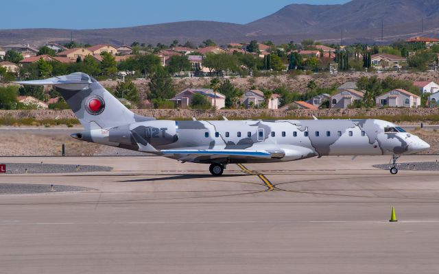 Bombardier Global Express (N2T) - A side view of the Oakley Sunglasses jet, displaying its amazing paint scheme. 