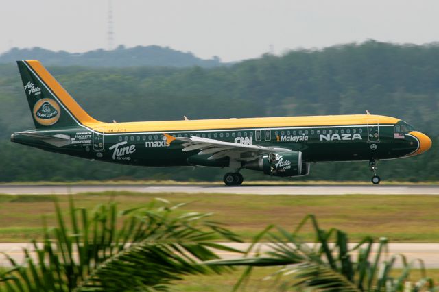 Airbus A320 (9M-AFY) - Team Lotus special livery