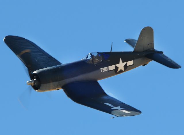 — — - An F4U-1D Corsair coming to show center during Capitol Air show demonstration at Mather field, Rancho Cordova, Ca.