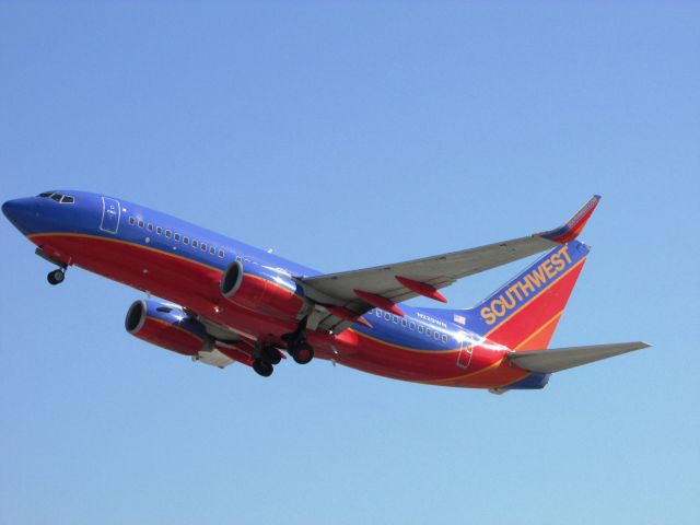 Boeing 737-700 (N229WN) - Taking off RWY 30