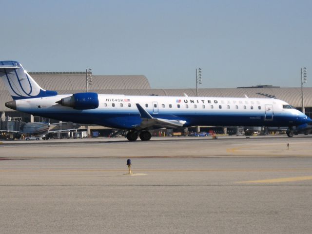 Canadair Regional Jet CRJ-700 (N764SK) - Holding on RWY 19R