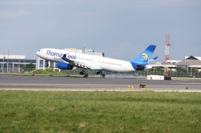 Airbus A330-200 (OY-VKI) - Touching down At Lester B. Pearson Intl Airport,Toronto,Canada,CYYZ/YYZ