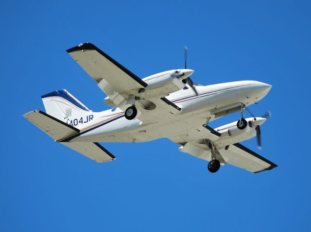 Cessna 421 (N404JR) - BOWLIN & ASSOCIATES INC on final for runway 2 at KJQF - 5/25/13