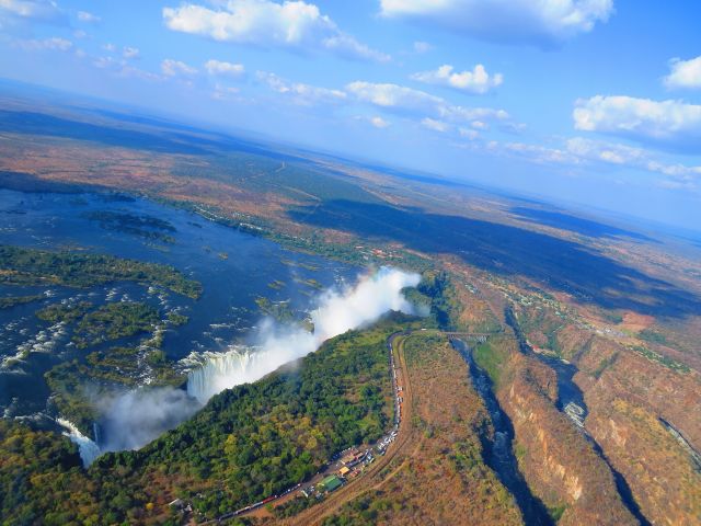 Bell JetRanger (Z-ZHC) - All 1704 metres of Victoria Falls as seen from Z-ZHC, near the high water mark in late May